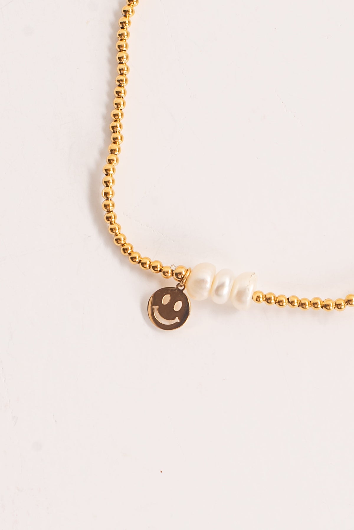 Ava Gold Beaded Pearl Smiley Face Charm Bracelet