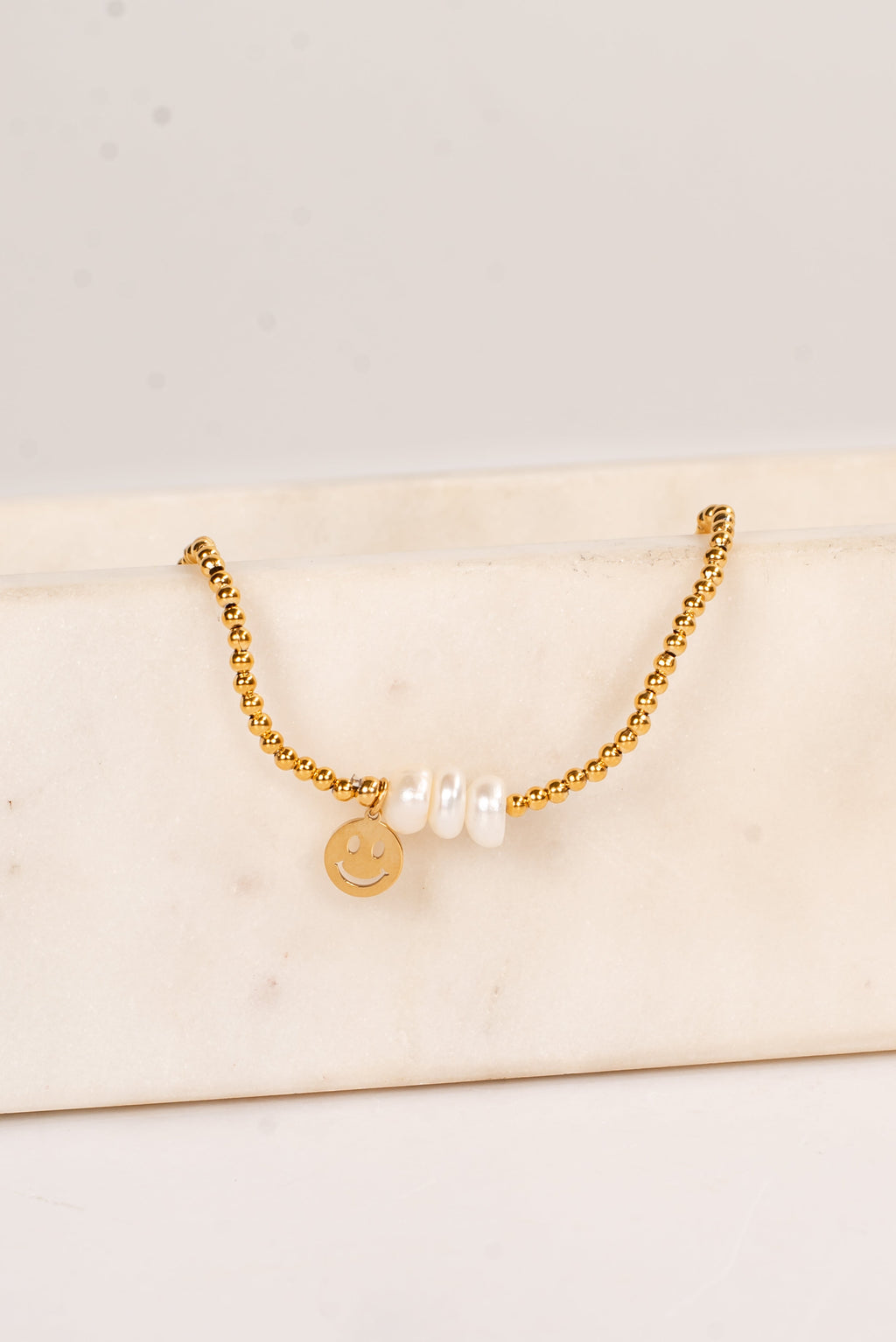Ava Gold Beaded Pearl Smiley Face Charm Bracelet