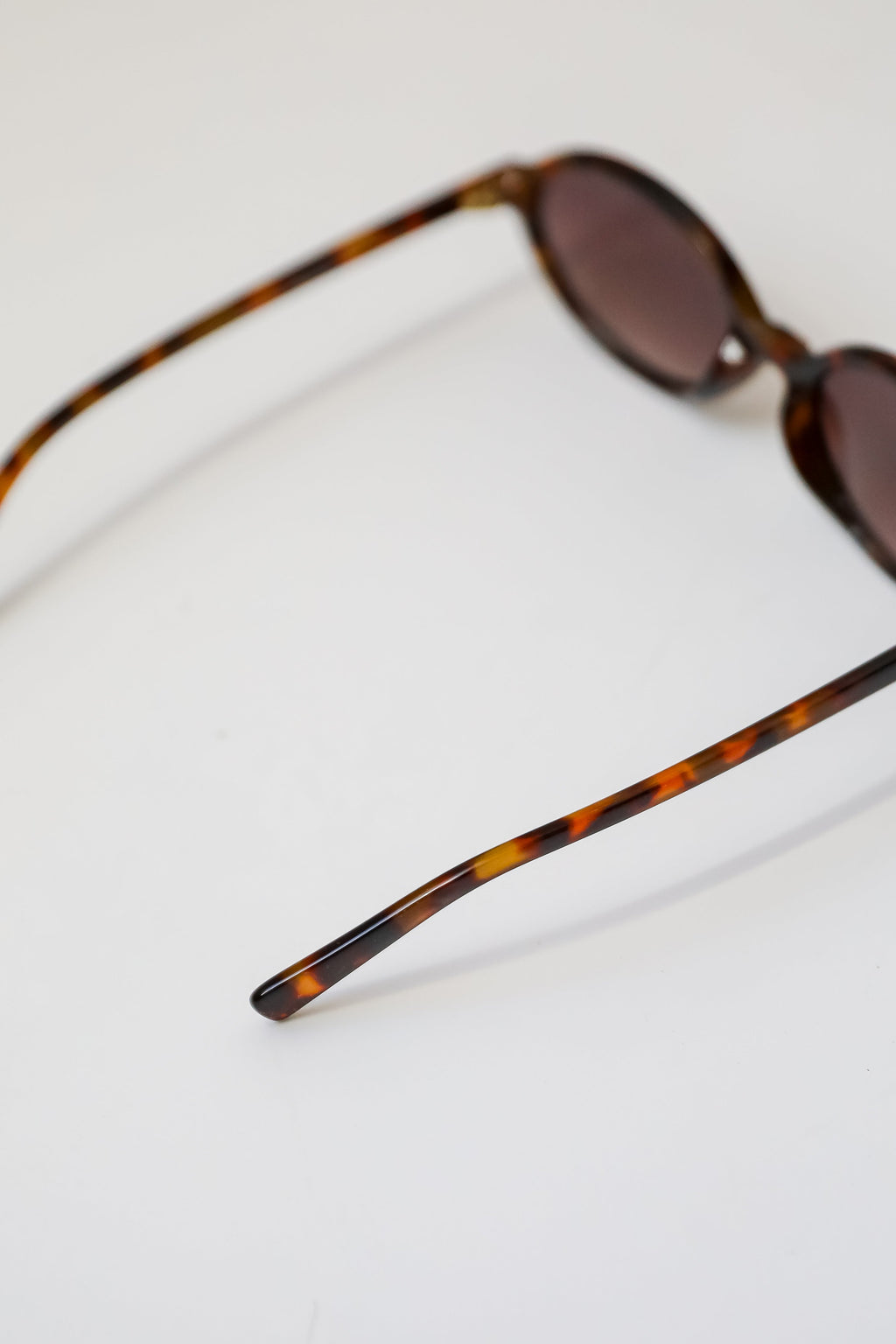 Comes In Waves Tortoise Oval Sunglasses